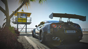 Race Your Way To The Top With Forza Gaming Wallpaper