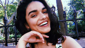 Rachel Zegler Smiling Outdoors Wallpaper