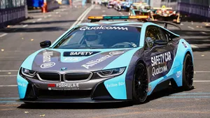 Racing Safety Car In Action Wallpaper