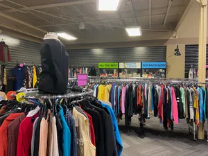 Racks Of Thrifty Clothes Wallpaper