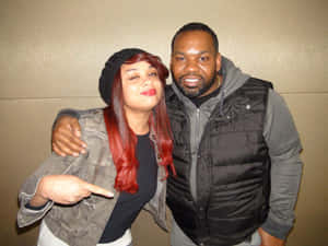 Raekwonand Fan Posing Together Wallpaper