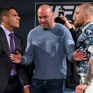 Rafael Dos Anjos And Conor Mcgregor Staredown Wallpaper