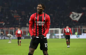 Rafael Leao A C Milan Forward Smilingon Field Wallpaper