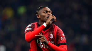 Rafael Leao Celebrating Goal Milan Wallpaper