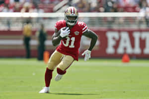 Raheem Mostert Running Action San Francisco49ers Wallpaper