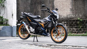 Raider 150 Fi Sporty Design Wallpaper