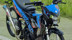 Raider 150 Fi Sporty Design Wallpaper