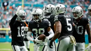 Raiders Celebrationon Field Wallpaper