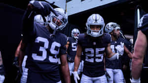 Raiders Players Entering Stadium Wallpaper