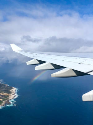 Rainbow On Plane Wing Wallpaper