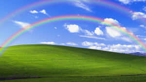 Rainbow_ Over_ Green_ Hills.jpg Wallpaper