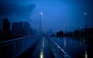 Rainy Evening Royal Blue Cityscape Wallpaper