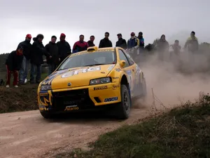 Rally_ Car_ Drift_on_ Dirt_ Road Wallpaper