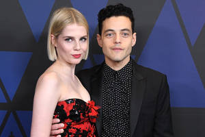 Rami Malek With Lucy Bonton Wallpaper