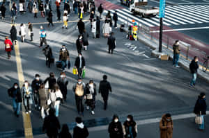 Random People Walking On Tokyo Streets Wallpaper