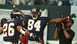 Randy Moss Celebrationwith Teammate Wallpaper