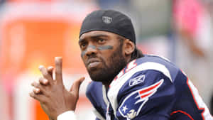 Randy Moss New England Patriots Sideline Focus Wallpaper