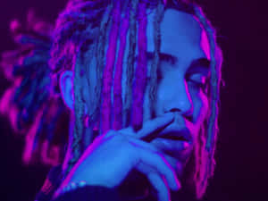 Rapper Lil Pump Breaking Barriers In Music Wallpaper