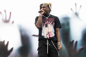 Rapper Performanceat Concert Wallpaper