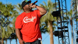 Rapper Performing Outdoor Concert Wallpaper