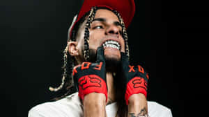 Rapper_with_ Grill_and_ Red_ Hat Wallpaper