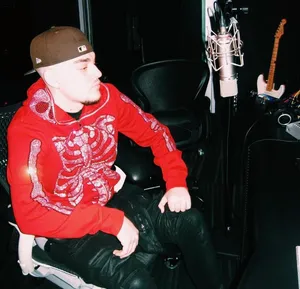 Rapper Yeat In Recording Studio Wallpaper