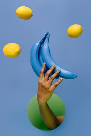 Rare Blue Bananas And Lemons Artistic Display Wallpaper