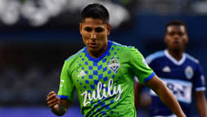 Raul Ruidiaz In Action On The Field Wallpaper