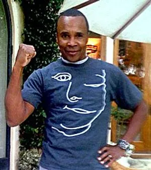 Ray Leonard Wearing A Blue Shirt Phone Wallpaper