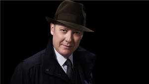 Raymond Reddington Stands In The Shadows In The Blacklist. Wallpaper