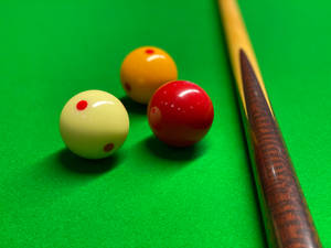 Ready For The Game - Billiard Balls And Pool Stick Wallpaper