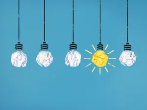 Rear View Of Hot Air Balloon Drifting Through Colorful Skies Wallpaper