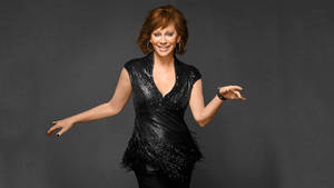 Reba Mcentire - The Iconic Queen Of Country Music Wallpaper