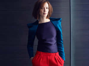 Rebecca Hall Posing Elegantly In A Red Dress Wallpaper
