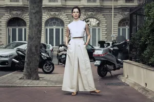 Rebecca Hall Striking An Elegant Pose In A Dazzling Outfit Wallpaper