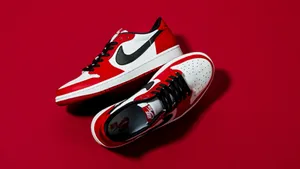 Red Air Jordan Shoes For Athletes And Sneaker Fans. Wallpaper