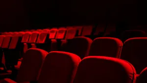 Red Audience Chairs Of A Theater Wallpaper
