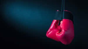 Red Boxing Gloves Hanging Dark Background Wallpaper