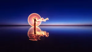 Red Chakra On Dark Ocean Wallpaper