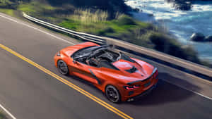 Red Corvette C8 Convertible Coastal Drive.jpg Wallpaper