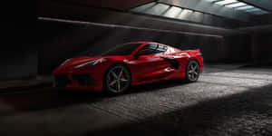 Red Corvette C8in Shadowy Garage.jpg Wallpaper