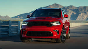 Red Dodge Durango On Road Wallpaper