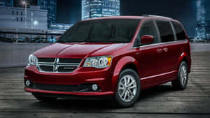 Red Dodge Grand Caravan Night City Backdrop Wallpaper