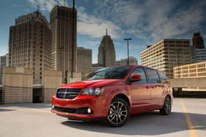 Red Dodge Grand Caravan Urban Backdrop Wallpaper