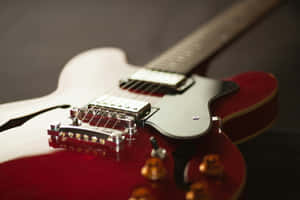 Red Electric Guitar Close Up Wallpaper