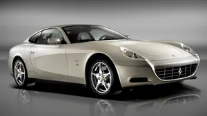 Red Ferrari 612 Scaglietti On The Road Wallpaper