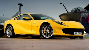 Red Ferrari 812 Superfast On City Street Wallpaper