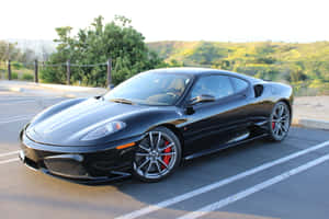 Red Ferrari F430 Speeding On Scenic Road Wallpaper