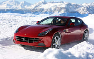 Red Ferrari Ff Cruising On The Open Road. Wallpaper