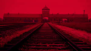 Red Filtered Memorial And Museum Auschwitz Birkenau Wallpaper